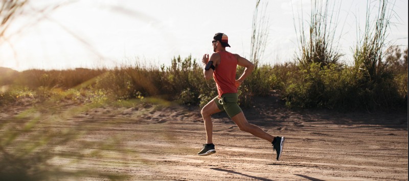 A long distance runner in the nature as the perfect example of the run far mentality