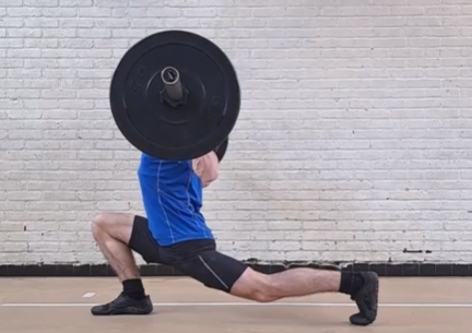 an athlete doing a KOT split squat as a part of tibialis training