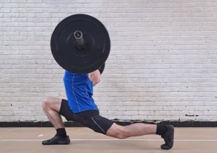 A man doing a split squat