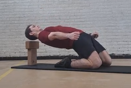an athlete doing reverse nordic curls