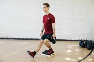 knees over toes for runners exercise - slant board step down
